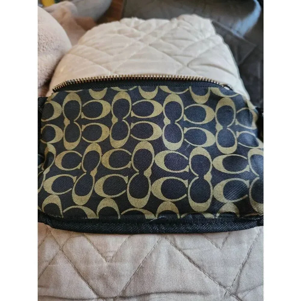 Coach signature canvas corner zip wristlet, black on black with Jacquard lining
